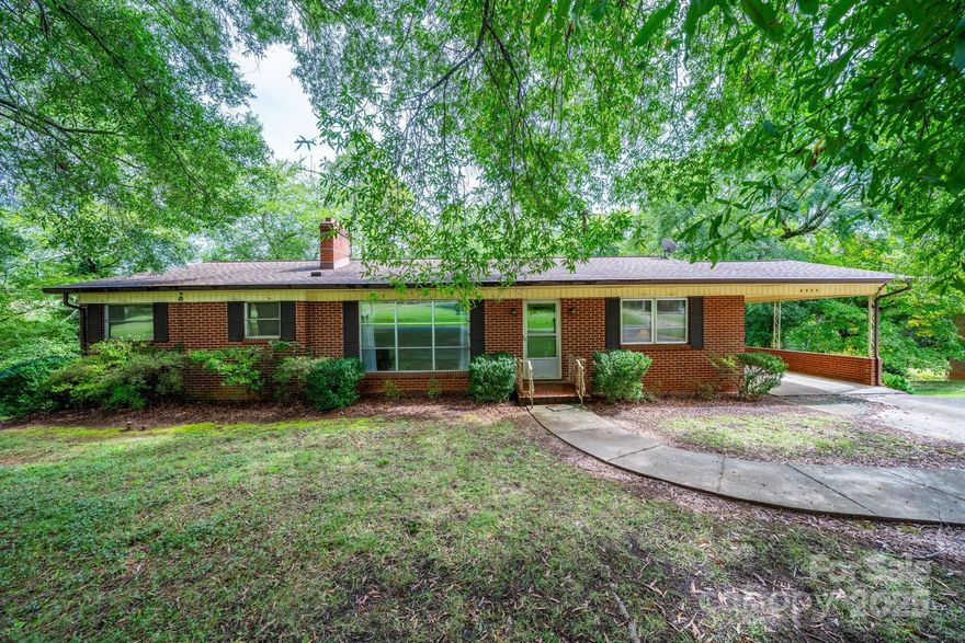 Take a look at this One Owner home! Large 1.5 acre lot!! Conveniently located just off of Hwy 321 with Easy access to Hickory or Lenoir AND right by Lake Hickory!!  NO CITY TAXES!  This 3 Bedroom all brick home features 1720 heated square feet on the main level and a FULL unfinished basement! Formal living room AND den! Living room features hardwood flooring and fireplace.  The full unfinished basement offers loads of potential for future expansion and a single garage door. Great school districts! Updated heat pump/central air in 2022 and architectural shingled roof.