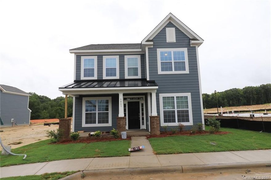Home is move-in ready w/ blinds and SS refrigerator! Charleston Alley load home w/oversized, detached garage. Great floorplan w/ spacious 3 bedrooms and loft on the second level. Twilight cabinets w/granite counters/tile backsplash in kitchen and hardwoods throughout most of downstairs.