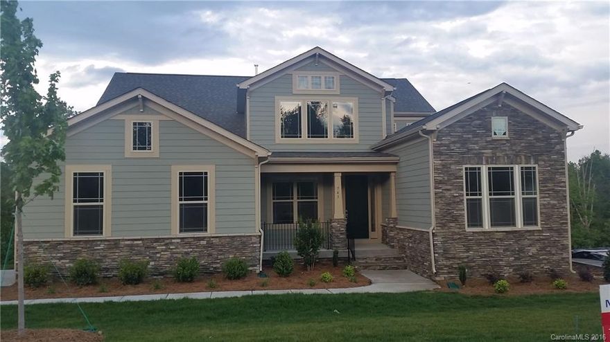 Beautiful Harrington Craftsmen with unfinished walk out basement with rough in for full bath, master and guest suite on first floor with own private bath and walk in closet, , open plan with designer kitchen appliances and cabinets, covered porch overlooked private backyard on Golf Course, 5 " hardwoods throughout,stone fireplace in family room with gas logs, 2 bedrooms up with open loft, 2 car side 
load garage,