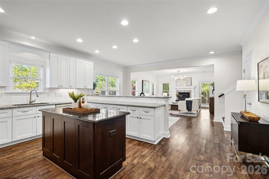 Modern Craftsman living with a rare oversized yard just minutes from Plaza Midwood, NoDa, and Uptown Charlotte! Located in the desirable Merry Oaks neighborhood, this move-in ready 3-bedroom, 2.5-bath home blends open-concept design, modern finishes, and indoor-outdoor living in one of Charlotte’s most sought-after close-in locations.

Built in 2016, this home features hardwood floors, a gas fireplace, and a bright kitchen with a large island, stainless steel appliances, and ample cabinetry—perfect for entertaining or everyday living. The spacious layout offers over 2,000 square feet with a main-level primary suite, walk-in closets, and flexible living space ideal for a home office or guest room.

Step outside to one of the home’s most impressive features—over a third of an acre, fully fenced with a private, oversized patio, creating the perfect setting for outdoor entertaining, pets, or future additions. This kind of yard is a rare find this close to the city.

Enjoy greenway access within the community for easy walking or biking to nearby hotspots, plus quick access to dining, shopping, and entertainment in Plaza Midwood, NoDa, and Uptown Charlotte. Additional highlights include a 2-car attached garage, low-maintenance exterior, and no HOA. 

If you’ve been searching for a Charlotte home with a large yard, modern style, and unbeatable location, this one delivers.
