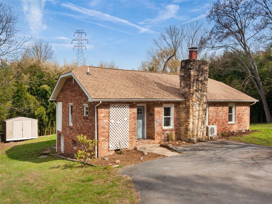 Peaceful country setting and easy year-round access set the tone of this 3 bedroom, 2 bath main level living home. Recent updates include a spacious kitchen and beautiful bathrooms, new laminate flooring & carpet, heat/air/mini split system, vinyl windows, encapsulated basement w/lifetime warranty, paved driveway and outbuilding. Massive rear deck perfect for entertaining or just resting a while.