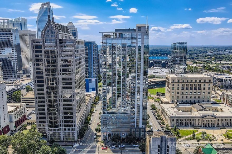 Experience Uptown living at its Best! Discover this stunning one-bedroom, one-bath condo in the highly sought-after Trademark building, where style, convenience, and vibrant city living come together. Inside, you’ll find modern design paired with floor-to-ceiling windows that capture the energy of Uptown. Step outside your door to enjoy the building’s exceptional amenities, including a rooftop terrace with breathtaking skyline views, a sparkling outdoor pool, a fully equipped fitness center, and inviting common areas perfect for grilling, entertaining, or connecting with neighbors. The location is truly unmatched—just one block from Truist Field, two blocks from Romare Bearden Park, 0.4 miles to the light rail, and 0.5 miles to Bank of America Stadium. You’ll also be surrounded by some of Charlotte’s best restaurants, nightlife, and cultural attractions. Whether you’re looking for a dynamic place to call home or a prime Uptown investment, this condo is a must-see. Schedule your private showing today and step into the Uptown lifestyle you’ve been waiting for!