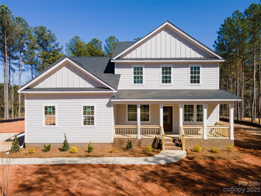 Welcome to Shepherds Trace in Clover, SC.  Tucked away in this beautiful private community with only a 5-minute drive to downtown Clover for all your shopping and dining. 
The primary bedroom on the Main on this 1+ acre homesite with a backdrop of the established landscape offers a sense of seclusion perfect for outdoor living options, pool, & other outdoor activities. Custom Country living at its finest with your large front porch and oversized front yard.
This open-concept plan features your Kitchen with quartz countertops, a gourmet hood, and a large island that opens to your Dining & Family Room that features a fireplace with lots of natural lighting. 
You will be wowed by your oversized deck off the back you will enjoy year-round. 
Impressive owner's suite with vaulted ceiling and an oversized shower you will love.  
4 bedrooms, 3.5 baths, loft, and an office.  Brand New Home, energy efficient, and a great value compared to the other options in the neighborhood.