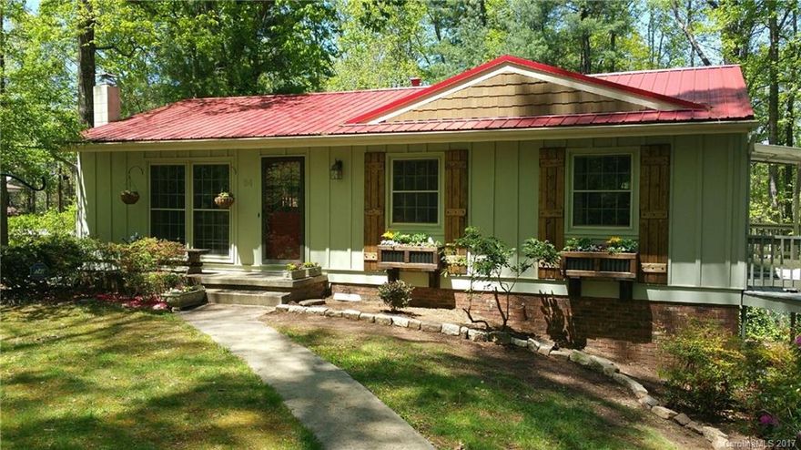 Amazing Zen Den updated to please with vacation rental possibilities.  Private fenced back yard with a natural light open floor plan. Open kitchen remodel with all new appliances, gas range, granite, vented hood and reverse osmosis water filter system under sink. New paint and updates throughout with all lighting and outlets replaced. Hardwood floors, crown molding, renovated and stabilized exterior decks. Hand made shutters and private deck off of Master. Workshop basement with room to expand.