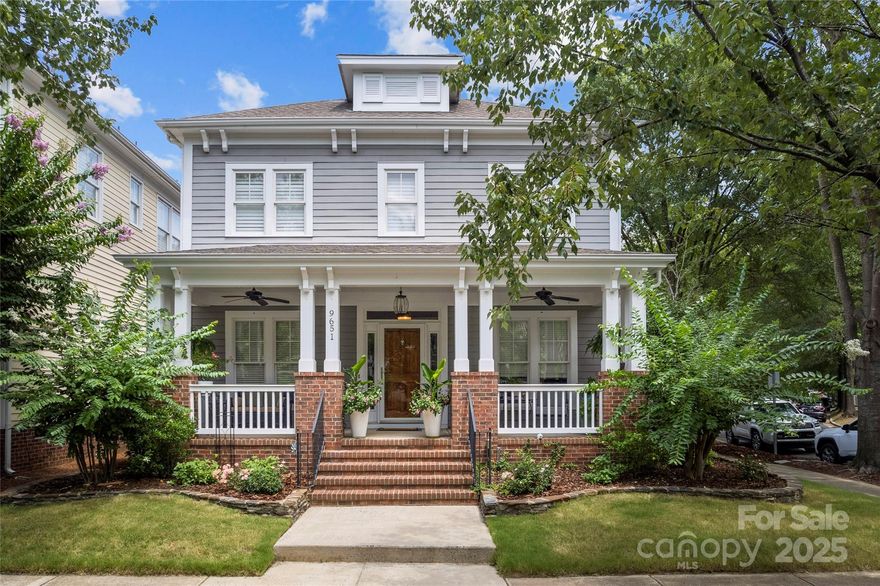 Tree lined streets lead you to this charming Charleston style home featuring a rocking chair porch & professional landscaping. Step inside to find a grand foyer that leads to a formal dining room, study w. french doors, powder room, conveniently located laundry room, a well appointed kitchen featuring 42" cherry cabinetry, granite counters, Bosch appliances, breakfast bar w. pendant lighting, breakfast room & an oversized great room w. slate surround fireplace. The main level features 9 foot ceilings, hardwoods & crown molding throughout. On the upper level you will find a spacious primary suite w. tray ceiling & luxury bath w. his/hers vanity, quartz counters, walk-in shower & heated floors. 3 generous size secondary bedrooms w. large closets & 2 full baths complete the upper level. Enjoying the outdoors is easy from the fenced back yard w. stone patio, turf landscape & oversized 2-car garage w. attic storage. Great location WALKABLE to Blakeney shopping, dining & the community pool!
