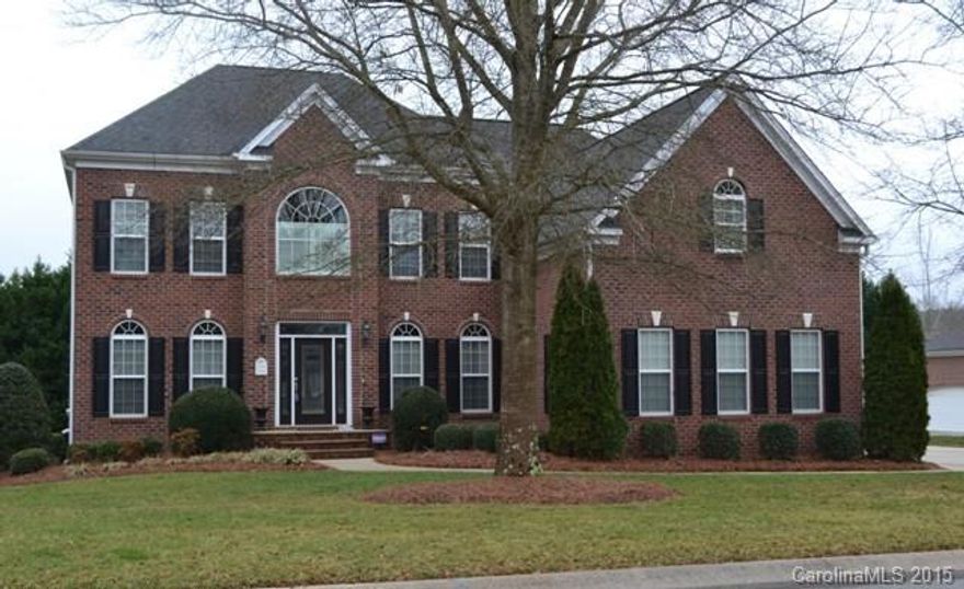 Gorgeous custom built home with all the bells and whistles. Tons of room. Stunning entrance, beautiful hardwood floors, open concept. Formal living room/office, dining room, sunken great room. Huge granite kitchen with stainless appliances & island. Guest bedroom also on main level. Upstairs houses master, secondary bedrooms and bonus room. Full, finished basement with bedroom, full bath, wet bar, den & office space. Fenced back yard, full irrigation, screen porch & patio!