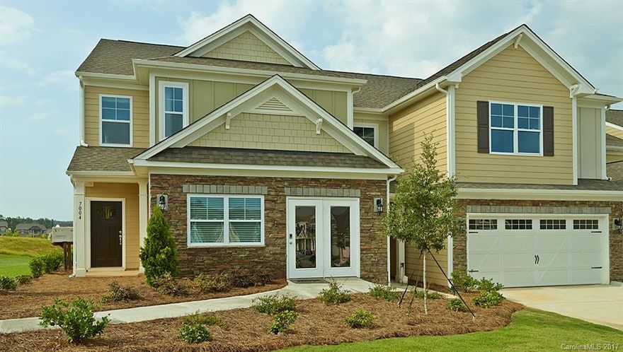 Forest Grove is finally open and selling this popular MASTER DOWN floor plan END UNIT! This 4 bed/2.5 bath townhome has it all! Granite in the kitchen and in all baths! Hardwoods on the main floor and tile in all the baths and in the laundry room! This 2 car 2400 sq ft townhome is loaded with options and priced to sell!!