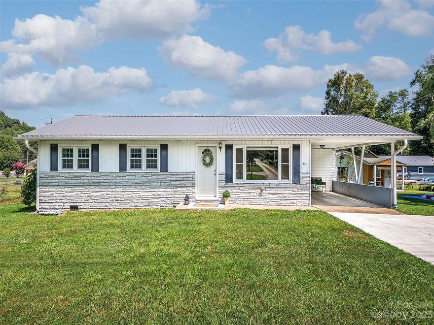 One level living in this mostly renovated 3 bedroom/1.5 bath conveniently located between Downtown Waynesville, shopping & Dining.  The setting is beautiful and perfect for kids, pets and entertaining with a  level yard and year round mountain views. Home offers, no city taxes, 1-car carport w/double concrete park area, large eat-in kitchen with pantry, spacious living room , laundry/storage room. Home features a metal roof, vinyl windows, heat pump, updated bathroom and kitchen. Outbuilding for storage or could be a workshop. Enjoy your morning coffee on the back porch. This property has high speed internet thru Spectrum.