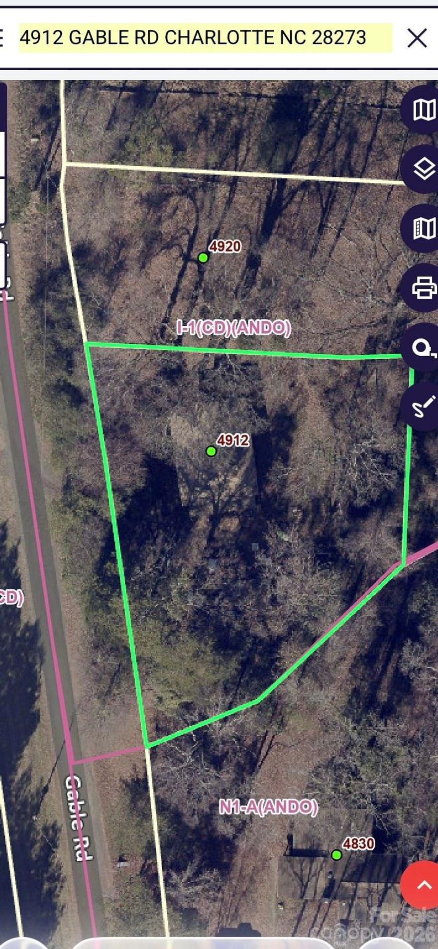 This is a unique property located in the heart of the Steel Creek area. Situated on a generous half-acre lot, this property features well and septic already in place and is zoned I-1(CD)(ANDO) with no HOA, offering incredible flexibility and potential. Prime location, usable land, and endless possibilities. House is being sold "AS IS" owner not doing any repairs. Please use showtime to schedule walking around property. House is zoned residential non conforming use at the moment (grandfathered in) until someone changes the use to commercial. Could be a great property for small business that needs small trailer parking .