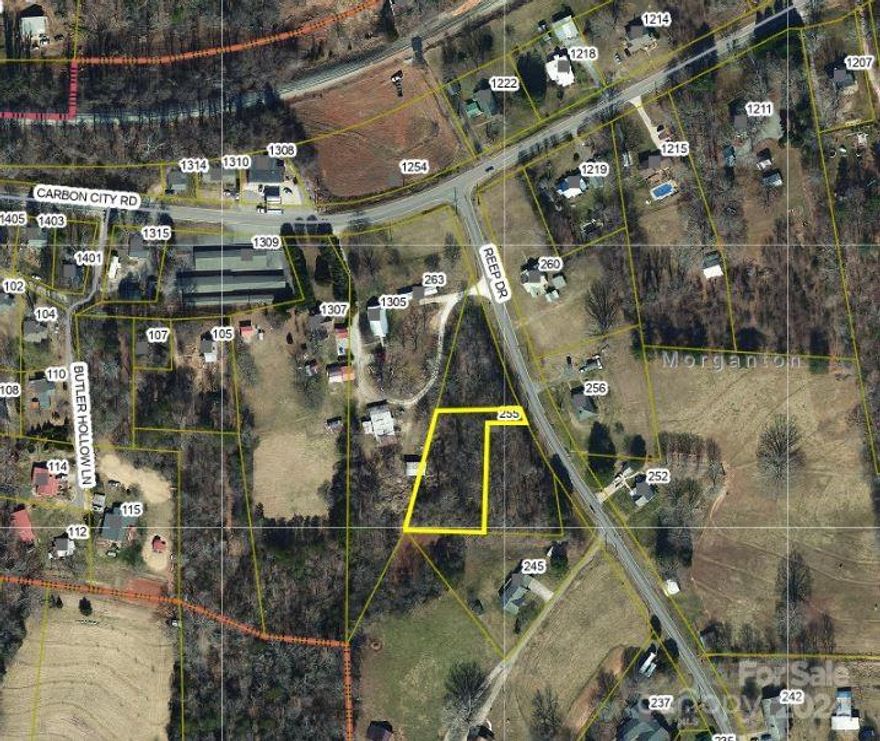 NEW ON MARKETt over 1/2 acre lot located in Morganton, will allow a modular home or site built. Located on  near big daddy's gas station on carbon city Rd. Property has access to county water and county sewer. Property has no restrictions a tiny house we'll go there, or a  standard home. Property is located near Morganton shopping and restaurants near I-40 exit 100. Near  schools parks  Lake James  Golf Coures Driving Range  Movie Theaters.