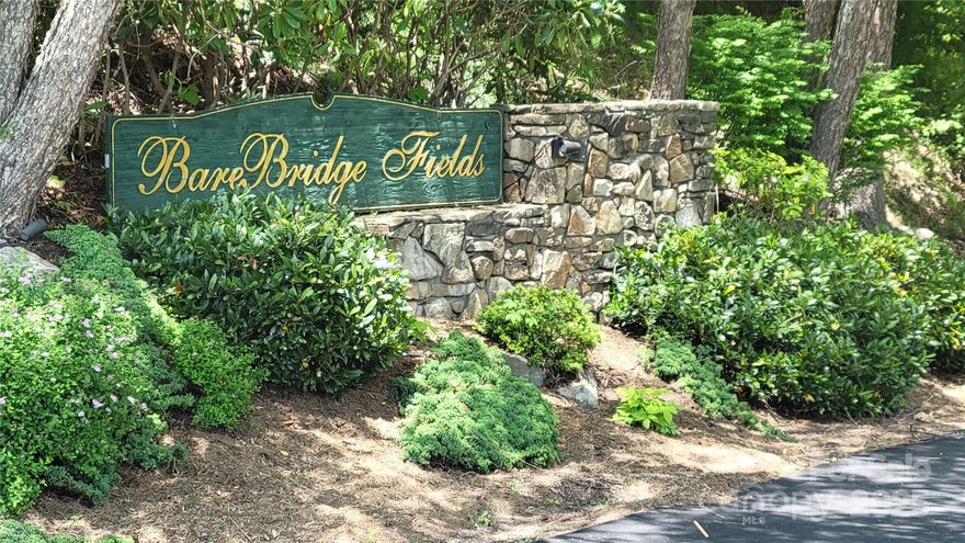 Build Your Dream Home in Barebridge Fields!

Discover the perfect mountain retreat on this 1.03-acre lot in the highly desirable Barebridge Fields community in western Yancey County. Lot 51 is ideally located near the main entrance off Highway 19E, offering easy paved access and a level entry road into the property. Enjoy the peace and privacy of country living while being only 30 minutes from Asheville.

This property is outside city limits yet conveniently connected to city water—the ideal blend of rural charm and modern convenience. Escape the crowds and experience the natural beauty of the Western North Carolina mountains while still being close to shopping, dining, and outdoor recreation.

Priced below tax value! Don’t miss this opportunity to own a beautiful homesite in one of Yancey County’s most sought-after communities.