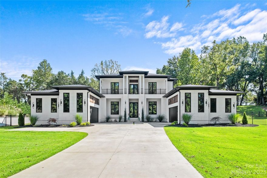 Step into a world of elegance - a custom home in Arbor Oaks, a gated community. French doors open to an open floor plan offering 12 ft ceilings, European oak wood floors throughout the entire home, and a chef's kitchen with a hidden secondary kitchen. Get cozy in the living room with a built-in fireplace and surround sound theater experience. An elegant dining area and a large laundry room fit perfectly into the open floor plan. Luxurious master bedroom with mini-bar, en-suite bathroom, and walk-in closets for him and her on the main floor. All bedrooms offer walk-in closets and en-suite bathrooms. The outdoor living space in this home is an entertainer's dream. Saltwater heated pool and hot tub, large covered outdoor living/dining with outdoor kitchen which has an automated screened-in porch. Complete in-home reverse osmosis system for pure water and solar panels to power this beauty. Complete in-home surround sound system for indoor and outdoor areas. Smart home features throughout.