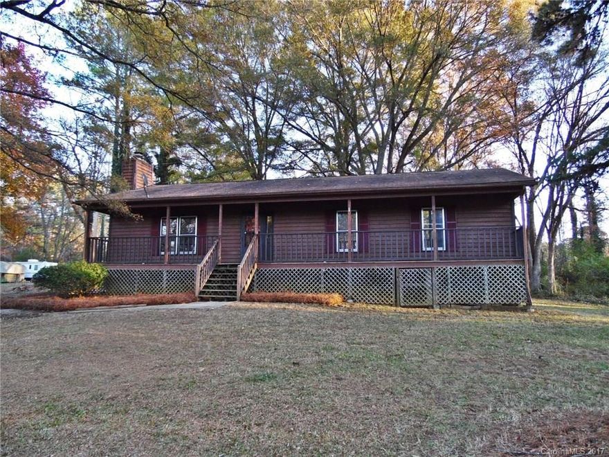 Located on a quiet shaded lot, this 3 BR/2 BA home has the potential to be the cozy ranch you have been searching for! The rocking chair front porch is perfect for a relaxing afternoon, deck on the back & a detached garage with storage. This home's interior is waiting on your personal touches, featuring a kitchen with lots of cabinetry, a large family room & spacious bedrooms. Strongly encouraged that offers include proof of funds/pre-approval & is required for seller's final acceptance.