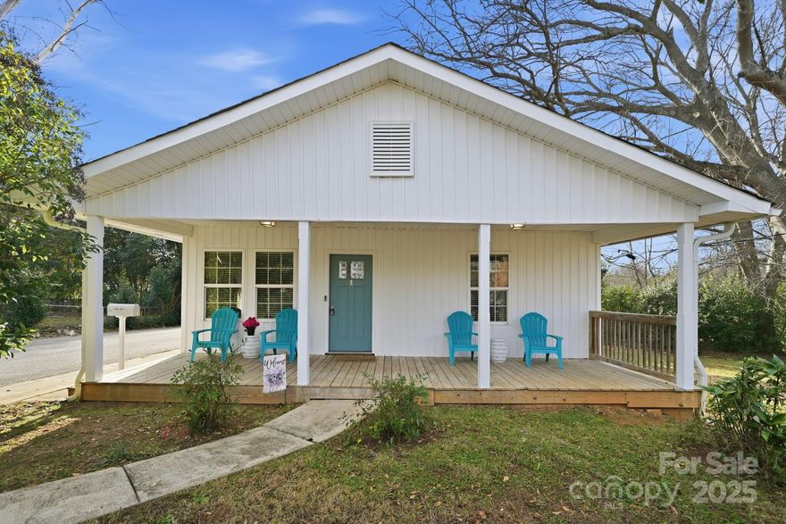 Welcome home to this beautifully updated ranch in lovely Belmont, NC! Ideally located just minutes from Belmont Abbey College and beloved local spots such as The String Bean, Sammy’s Pub, Stowe Park, and the historic Belmont Downtown District. Spend weekends browsing charming boutiques and breweries, strolling through the stunning Daniel Stowe Botanical Garden, or catching a show at the Belmont Abbey Amphitheater or Trail Race Marina—there’s always something nearby to enjoy.

Relax on the inviting rocking chair front porch before stepping inside to an open-concept layout where the living and dining areas flow seamlessly into the kitchen. Stylish LVP flooring runs throughout, and the beautifully updated kitchen features quartz countertops, a tile backsplash, and stainless steel appliances—perfect for cooking and entertaining.
The home offers three generously sized bedrooms, all with ceiling fans, and two fully updated bathrooms. Outside, enjoy a spacious wooded lot that provides both privacy and versatility.
Conveniently located just a short drive from Charlotte Douglas International Airport and Uptown Charlotte’s endless dining, sports, and entertainment options, this home delivers the perfect blend of comfort, accessibility, and lifestyle. With modern upgrades, a desirable location, and move-in-ready condition, this property is also a fantastic investment opportunity in one of the Charlotte metro area’s most sought-after communities.