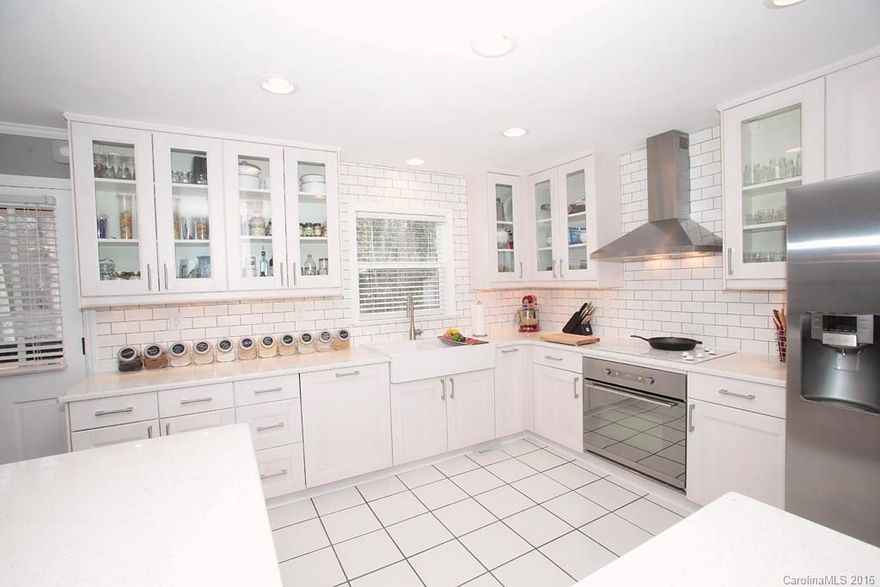 Feast your eyes on this deliciously designed gourmet kitchen! Open interior floor plan and oversized backyard + deck makes this home perfect for entertaining.  Situated in one of south Charlotte’s most desired areas, Spring Valley boasts rolling hills, large lots and a plethora of gorgeous, mature trees.  Newly renovated bathrooms, fresh paint, hardwoods, walk-in tall crawl with 12×12 pad, full brick and newly landscaped.