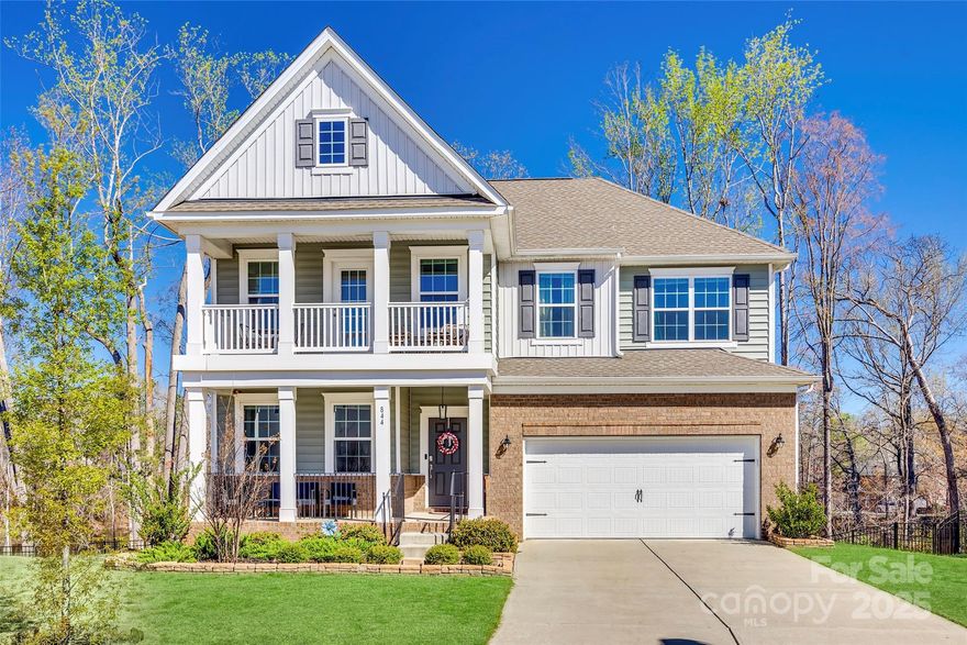 Rare 5R, 5BA gem located in the highly sought-after Fort Mill School District offers an exceptional living experience. Open-concept main floor features kitchen with quartz countertops, stainless steel appliances, and large island perfect for entertaining flowing to a spacious deck overlooking the backyard with breathtaking pond views. You will also find a cozy living and dining area, bedroom with full bath, and versatile den/office. Upstairs, the oversized master suite is a true retreat, complete with a spacious bathroom and an expansive walk-in closet. Three additional bedrooms, two full baths, and dedicated laundry complete the second floor. Newly finished walk-out basement is an entertainer’s dream, with a second full kitchen, full bath, and French doors opening to the backyard with direct access to the tranquil pond. Enjoy a garden bed, under deck storage, and a peaceful setting just steps from your door. Don't miss this rare chance to combine luxury, convenience, and nature!