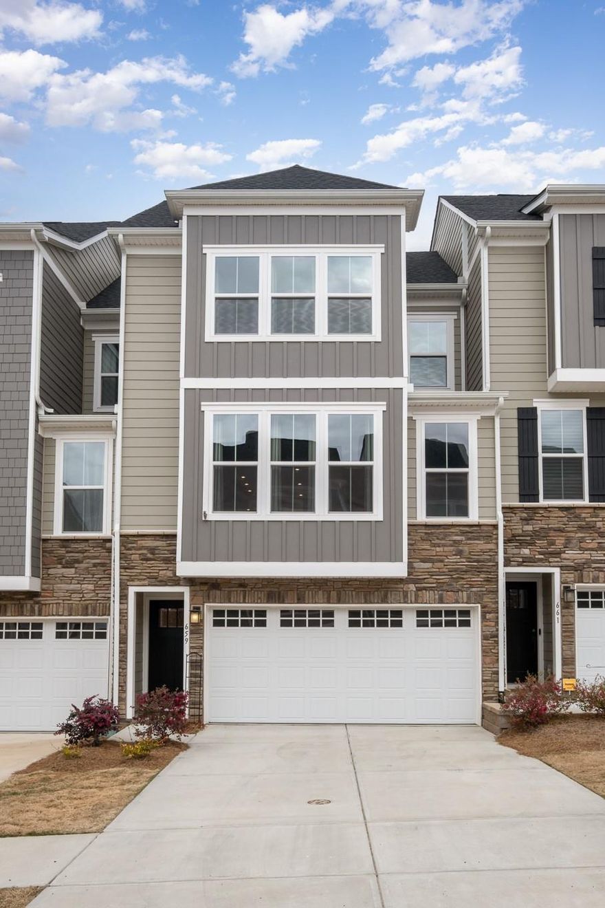 Trinity Townes is a walkable community, minutes from Lake Wylie with access and everything that lake living offers! This 3-story, 4 bed, 3.1 bath, 2,211 sq ft townhome offers a great open living concept with a 1st level guest suite with a full bath. On the main level you will find a lovely open floor plan featuring the kitchen, dining area, living area, half- bath and an incredible covered deck complete with a fire place. The kitchen features an oversized island and ample storage space. The living area is complete with custom built-ins that make this space one-of-a-kind. On the upper level you'll find 3 bedrooms including the primary suite. The primary features tray ceilings, a walk-in closet and dual vanities and a glass shower. The laundry is also ideally located on this floor. The property was recently painted throughout. Brand new carpet. Outdoor furniture will convey. You don't want to miss this gem!