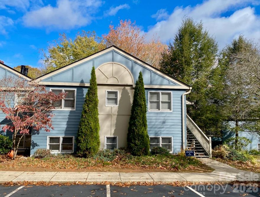 Experience peaceful mountain living at beautiful Lake Junaluska in this tastefully updated 2-bedroom, 2-bath condominium at Tri-Vista Villas. This move-in ready, second-floor end unit offers privacy, tranquility, and views from the spacious covered porch. Inside, you’ll find an inviting open floor plan with modern finishes throughout and sliding glass doors that bring in abundant natural light. The cozy living room is perfect for cool mountain evenings. The kitchen (remodeled in 2023) has a large serving area and is equipped with granite countertops, a breakfast bar, and stainless steel appliances— ideal for both cooking and entertaining. Both bathrooms have been tastefully updated, and luxury vinyl plank and tile flooring flow seamlessly throughout the home. The in-unit laundry (with new full-size washer and dryer) provides convenience, while two assigned parking spaces make coming and going easy.
Enjoy low maintenance living with HOA amenities that include lake access, walking trails, a golf course, tennis courts, and an outdoor pool—all within the scenic Lake Junaluska community. Whether you’re seeking a full-time residence, vacation retreat, short-term rental or investment property, this condo offers the perfect blend of comfort and style, with a convenient, idyllic location.  New roof installed in September of 2025. Furnishings negotiable.