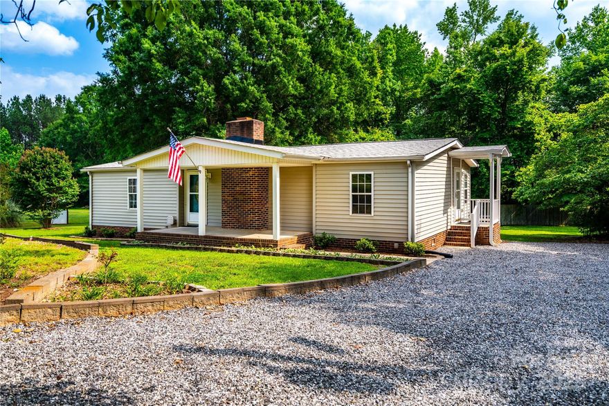 Don't Miss Your Second Chance! Nestled approximately 3+ acres in Denver, this beautifully updated 3-bedroom, 2-bath home offers the perfect blend of modern comfort and country charm. From the fresh flooring to stylish lighting and remodeled bathrooms, every detail has been thoughtfully upgraded. The MAGNIFICENT 24x40 workshop/garage is a dream for hobbyists, car lovers, or anyone needing extra storage. Enjoy relaxing on the covered porch, entertaining on the back patio, around the fire pit or exploring your expansive outdoor space with a farm-like feel—complete with privacy and room to roam. Located just minutes from downtown Denver, you’ll have easy access to shopping, dining, and schools while enjoying peaceful rural living, along with easy access to Charlotte Metro. This one has it all—style, space, and a setting that’s hard to beat! And NO HOA!!! WELCOME HOME! Sale fell thru due to a lien on the property which has now been satisfied.