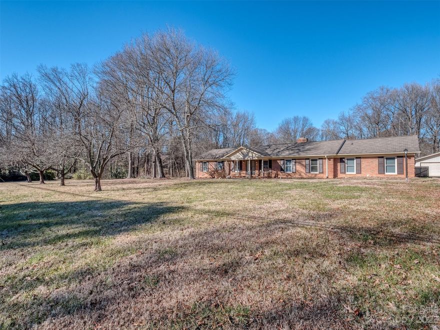 This is an amazing opportunity to own almost 2 Acres in Huntersville mere minutes from Northlake Mall, I77, and all that Charlotte has to offer.  This large Ranch Style home has been loved and lived in for a very long time.  It is waiting for the right buyer to come along and add the touches to make it their own.  You will feel the love when you walk through this home!  It also sits on 2 parcels making up the total acreage of 1.89.  Combine the two to have one large awesome lot, or keep them separate and build a place for a friend or family member.  There are no known defects, but the home is being offered in as-is condition.  You will be shocked to see 4 spacious bedrooms, 3 full bathrooms, formal living & dining rooms, a large den (formerly the attached garage), & much more!  Don't delay!  Make your appointment to see this amazing home with tons of possibilities today!