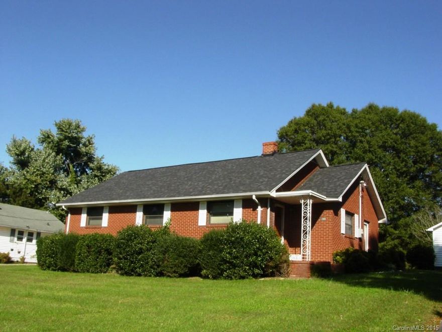 Within your reach, 2 bedrooms, 1.5 baths, all brick, new roof, new electrical. Featuring spacious living room, quaint dining & kitchen, cozy den. A lot of house for the $$.