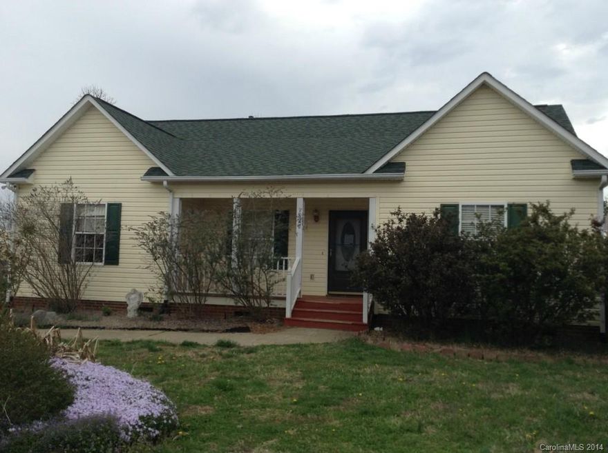 3 bedroom 2 bath split plan with new kitchen cabinets, appliances, beautiful laminate and tiled floors, gas fire place, detached storage, carport, fenced in rear yard, fresh paint... oh its just a doll house!  This is a Fannie Mae Property.