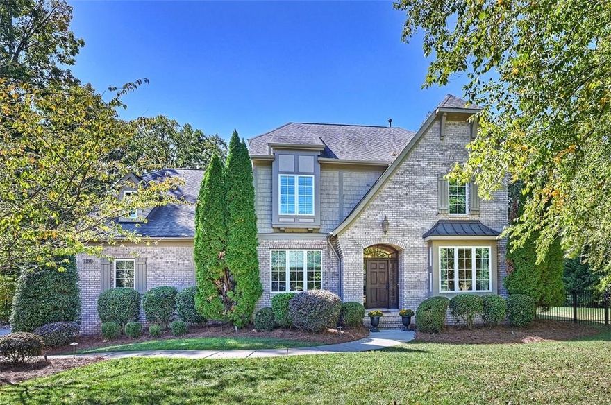 Ideally located on a cul-de-sac in the gated Sconset Village section of The Point. This classic brick home offers seasonal water views & privacy. Gorgeous saltwater pool & spa w/waterfall & extensive travertine decking completed in 2021. This Siminoni built home is full of thoughtful details & quality craftsmanship. A wide foyer leades to open main living space that includes a chef's kitchen w/light cabinets, a large center island & GE Monogram appliances. Open to the kitchen is the breakfast area & great room w/bult-ins flanking the FP. GR opens to large screend porch. Main level office w/french doors. Owners added drop zone off 3 car garage. Main level primary suite w/huge closet & flex room. 2nd level w/3 BR, bonus room, loft study area, media area, & exercise room.  New interior paint in main living areas, new carpet, newly finished hardwoods, updated light fixtures, sealed crawl space, added Hague water purification. Boat slip Z#96 included, boat lift is negotiable.