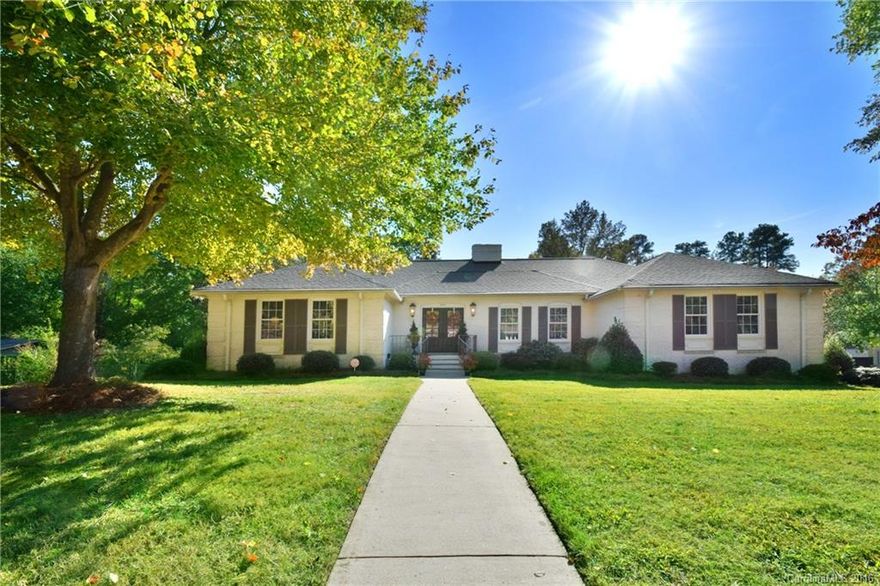 Small town living at it's best in a gorgeous renovated home! Looks like it's right out of "House Beautiful" mag. Sitting on .65 acres, this lovingly remodeled  & cared for home is a winner! Beautiful hardwood floors, new windows, doors,2 new Trane HVACs, new toilets, sinks, roof - see entire list in attachments.  The lower level offers 804 finished SF with fireplace, a full bath, a wet bar, plus 700 SF unfinished. Fully fenced yard, patio, & deck plus a 2 car garage! MUST SEE!