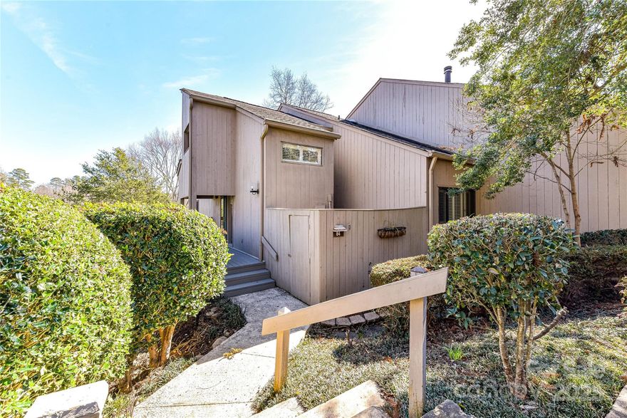 WATERFRONT, end-unit condo on beautiful Lake Wylie in River Hills! Spacious Great Room with vaulted ceilings, built-in wet bar and gas log fireplace.  Kitchen has maple cabinetry, solid surface countertops, all stainless appliances, pendant lighting, and a built-in desk area. Breakfast nook with sliding glass doors leads to the deck, overlooking the water. Guest Bedroom and full bath on main level. Large Primary Bedroom on the second level with private deck and spacious closet with adjoining storage area. Updated Primary bath with tiled floors and a frameless shower with tile surround. Loft area on second level with built-in bookcases and private balcony. Spacious Rec Room as well as two additional bedrooms located on the lower level. Additional outdoor living spaces include a lower level patio, overlooking the lake.  Lovely community pool within walking distance. 2 assigned parking spaces.  Both HVAC units, 2018.  Enjoy lake living at its finest!