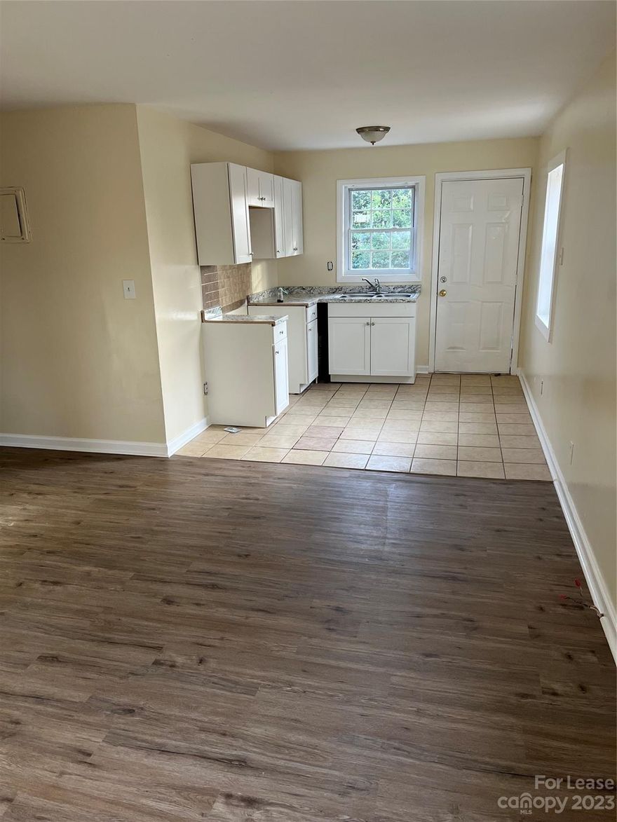 Welcome to this beautifully renovated 3 bedroom, 1 bathroom gem nestled in the heart of the charming Washington Heights Neighborhood, just a short drive from the vibrant uptown Charlotte. With its fresh paint, new LVP flooring, new cabinets and stylish fixtures throughout. The spacious living area is perfect for gatherings, stove and refrigerator included. Each of the three bedrooms offers comfortable space and natural light. The updated bathroom provides a clean and crisp feel. Washer and dryer included!