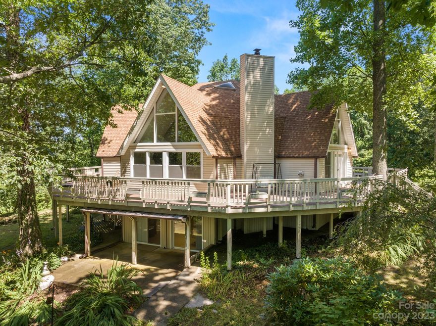 Adjusted to the appraised value- Welcome to this one of a kind, spacious home nestled amongst nature's beauty of mature trees, privacy, all while embracing beautiful winter views. It is certainly a unique opportunity to live in a home nestled in Zirconia, between Kenmure and Pinnacle Falls on Mt. Olivet Road with no HOA fees. It has over 4650+ sq ft spanning over three levels of living! Utilities are very reasonable!!! This home offers many features such as a wrap around deck, 3 bedrooms, and several bonus spaces, including a loft, ample storage and...a 5 bay, heated garage with water and a workshop! Om the basement level there is a room for optimal cool storage, a workout area and a sauna. With the outside entrance and the kitchenette, the basement is perfect for an in-law suite or an apartment. This 1.89 +/- acre lot has a variety of fruit trees, bushes and native plants, also room for a garden. Fun fact - Zirconia residents have Lake Summit access! Schedule your appointment today!!!