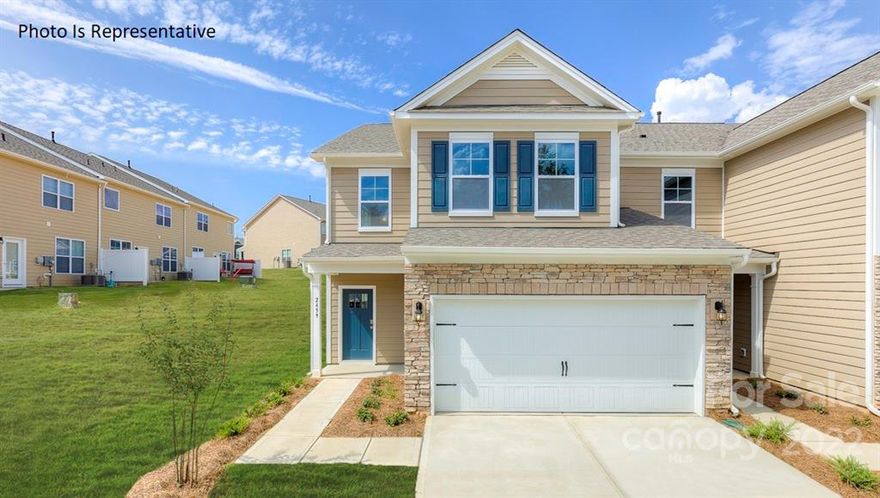 Spacious 4 bedroom townhome in ideal location!  Minutes from Ballantyne location with low SC taxes! The 'Livia' features an open floorplan, guest suite on main level, huge primary bedroom with dual vanity with soaking tub and shower! 2 additional bedrooms on upper level and loft area for entertaining! Granite counters throughout, stainless steel appliances, and convenient drop zone area upon entry! 
This END UNIT won't last long!!