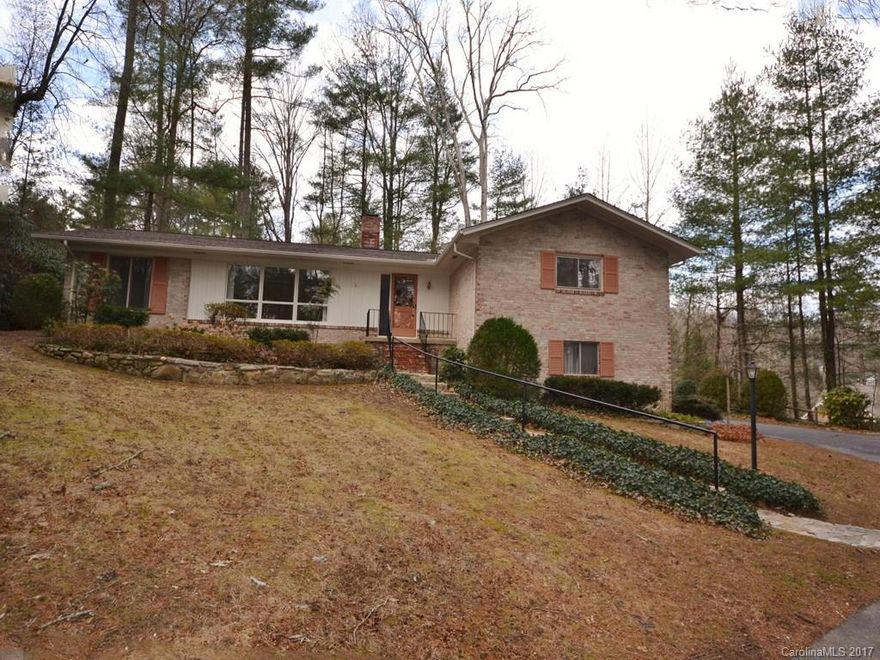 Indian Hills-Lovely 3BR/3BA brick home built by Pete Green. Move-in ready. Updated kitchen, stainless steel appliances and granite counter tops. Kitchen flows to den that will be the hub of the home with crackling wood burning fireplace. Downstairs is spacious heated, and cooled playroom. Oversized garage. New roof, 2016.