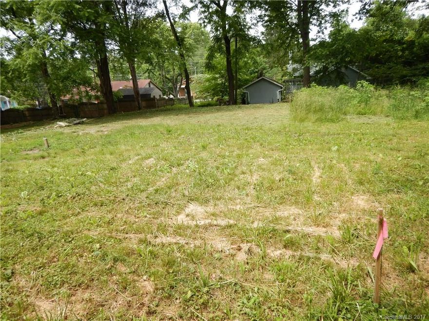 Great opportunity for buildable homesite right on Haywood Rd! City water and sewer already in place for this level lot which is mostly clear with some mature trees. So come see for yourself and picture living within minutes of downtown Hendersonville!