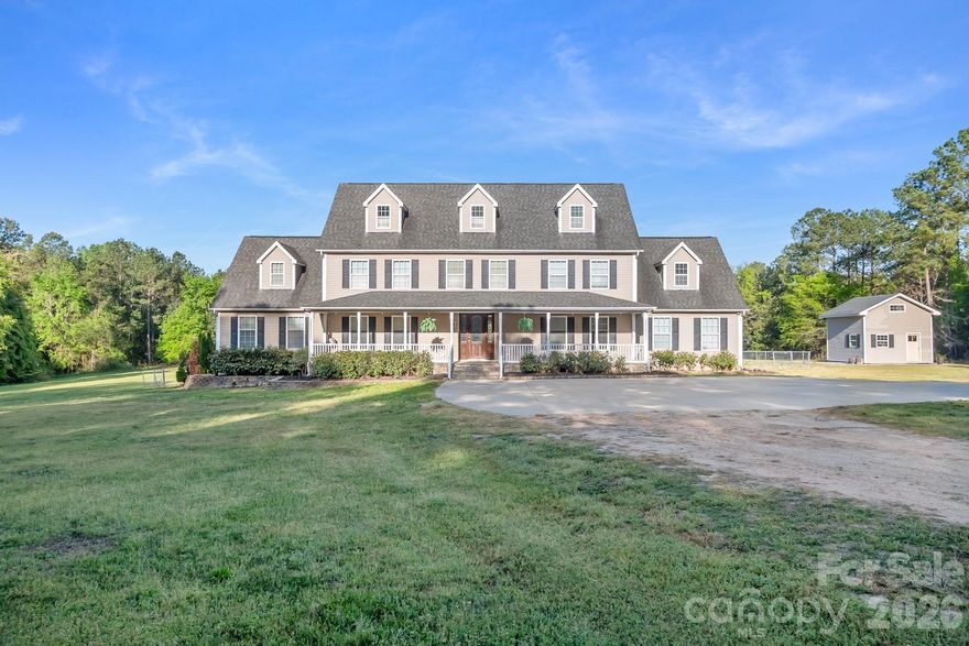 Are you searching for privacy, acreage, and endless possibilities? Whether you’re dreaming of a hobby farm, equestrian property, family compound, or simply a peaceful place to call home—this exceptional property delivers.

Situated on 45 acres, this impressive 5,400 sq. ft. home is surrounded by a beautiful blend of hardwoods, pines, and open pasture, with a serene creek along the back of the property—offering both functionality and natural beauty.

Step inside to a warm and inviting living room, recently enhanced with a custom-built fireplace/tv unit, creating the perfect focal point for relaxing and gathering. The heart of the home is the expansive kitchen designed for entertaining, featuring a large island, gas cooktop, abundant cabinetry, and a spacious dining area. All kitchen appliances have been recently updated and convey with the home. Just off the kitchen, you’ll find a formal dining room, half bath, and laundry/utility room for added convenience.

The main level features hardwood flooring throughout, along with two primary suites enhanced with new LVP flooring—ideal for guests or multigenerational living.

Upstairs, the second floor also features hardwood flooring throughout the main living areas, with carpeted bedrooms for added comfort. You’ll find an open loft, three generously sized bedrooms, two full bathrooms, and a dedicated home office. Continue to the third floor where you’ll find a fully finished bonus room—perfect for a media room, playroom, gym, or flex space to suit your needs.

Outdoor living is just as impressive with a large, recently rebuilt deck overlooking your private oasis. The outdoor shade system conveys. Enjoy peaceful views, a fenced area for pets, and ample space for entertaining or simply unwinding. Walking paths have also been created throughout the property, allowing you to fully enjoy the beauty and privacy of the land.

The property includes three outbuildings, one featuring a lean-to—ideal for equipment storage or future agricultural use.

Additional updates include the upstairs HVAC unit replaced in 2015, the downstairs HVAC upgraded to a larger unit in 2023 with a 10-year warranty, fresh paint throughout, and the septic tank pumped in February 2026.

This is more than a home—it’s a rare opportunity to own a versatile property where lifestyle, space, and privacy come together.