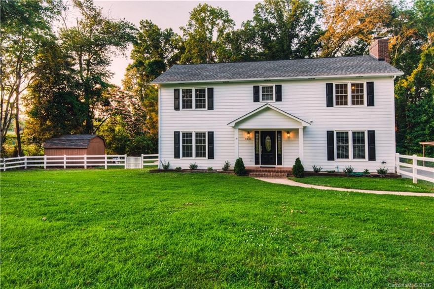 Classic Neo-Georgian Pool Home on nearly an acre in Rock Hill – but with county taxes! Featuring large fenced yard, awesome 2 story barn, on a wooded homesite w/all the privacy that you could want while still being convenient to everything. Highlights include a well-designed kitchen & breakfast nook, formal dining, family room AND flex room/study on first floor.  This beauty is freshly painted throughout & ready for your family. Opportunities like this don’t come up very often, don’t miss it!