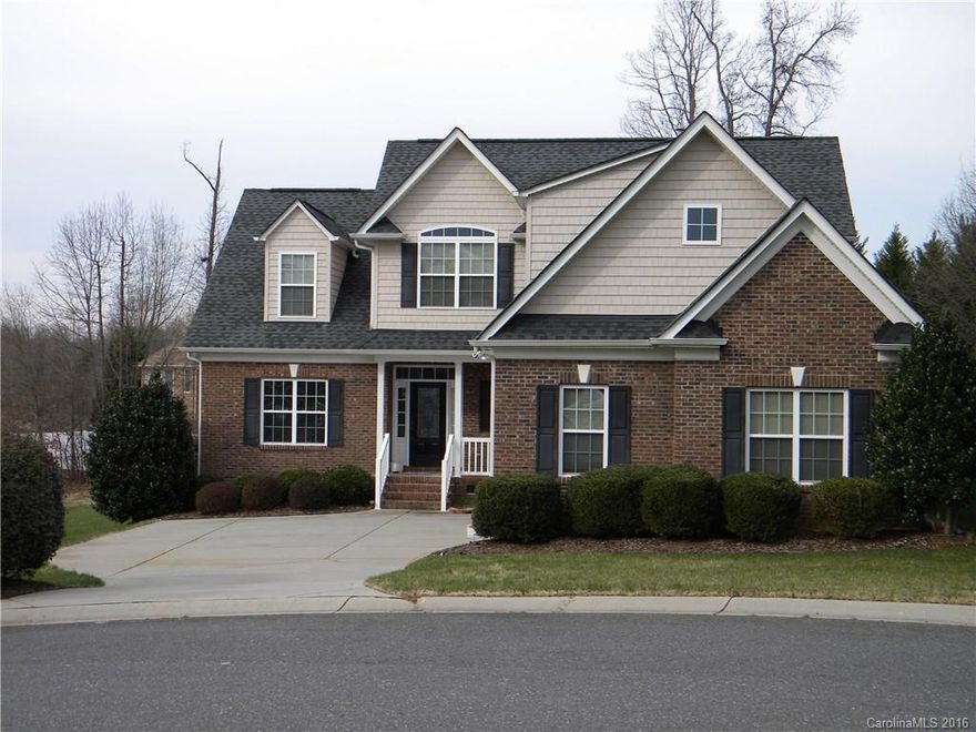 Lovely brick home in the cul-de-sac, great views of the pond from back screened porch, superb island in the kitchen and open to a large breakfast or keeping room for entertaining, large master on main with rope lighting, wonderful hardwoods on main.   ONLY LOW COUNTY TAXES!