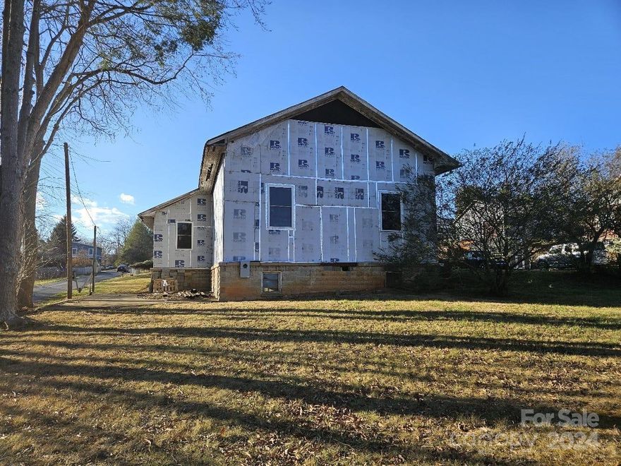 This unique property offers a rare opportunity to own a church that is currently undergoing construction, with approximately 50% completion. Located in a vibrant and sought-after area of Asheville, this property is full of potential for the savvy investor or developer as it is zoned R-3.
 With its classic architecture and potential, this property stands out as a landmark in the community. The current construction phase provides the perfect blank canvas for customization and finishing touches to transform this space into a truly remarkable establishment. The interior of the church boasts spacious rooms with high ceilings and ample natural light, creating an inviting atmosphere. The layout allows for versatile usage, whether it be continued as a place of worship, converted into a community center, event space, or reimagined into a one-of-a-kind residential property. Don't miss out on the chance to own a piece of Asheville history and create something truly special.