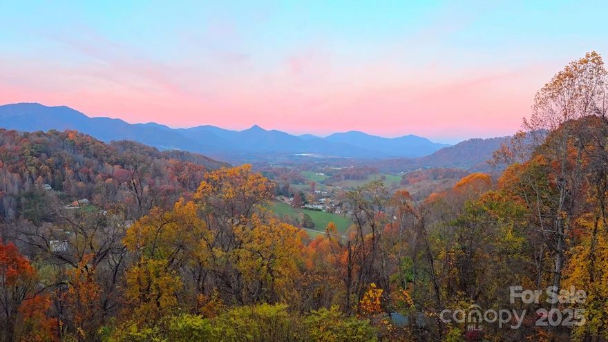 Sitting atop a ridge over 3000 ft high, this low maintenance home provides both sunrise and sunset; also sun all day long. There is no land above the home that might slide down and no water below that may rise. Foundation is on a gentle slope; mountain living with less worry. 
Expansive, long range views. 10 minutes to Waynesville, 20 minutes to Asheville, and 5 minutes to Clyde. Convenience, elevation and safety without highway noise, a rare find. 
Authentic mountain home surrounded by nature instead of neighbors.
Perfect for short-term, long-term rental or full-time mountain living. Leave the heat and mosquitoes behind. Cherokee/Harrah Casino, Cataloochee Ski Resort, snowboard park. Mountain biking, hiking and world-class fly fishing. Great restaurants, music & culture w/ 18 mountain peaks over 6000 feet! 
Extremely safe neighborhood with great road and low fees. High speed fiber optic just laid. 
Cedar Lap Siding. Newly updated kitchen and bath, truly mountain cabin aesthetic.