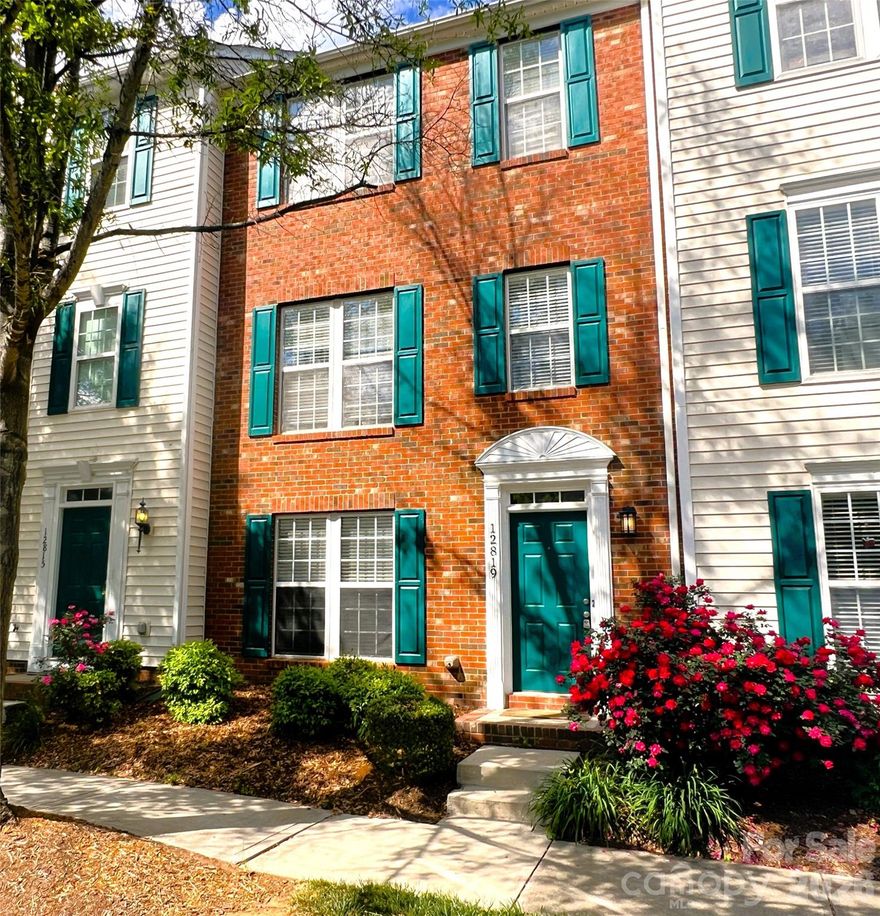 Welcome to this beautifully renovated 3-bedroom, 2-full, 2-half-bath townhome in the Blakeney Greens community. Modern finishes and thoughtful design include new wide-plank hardwood floors, fresh paint, new hardware, lighting, and fixtures throughout. Both staircases feature new wood treads with subtle under-tread lighting.

An expansive open living and dining area with a kitchen pass-through is ideal for entertaining; in-ceiling surround sound is wired in the living area. The updated kitchen offers new cabinets, quartz countertops, a tiled backsplash, and new appliances. A large deck off the living room provides great space for dining and relaxing.

The primary suite includes a tray ceiling, walk-in closet, and a spa-like en-suite with dual vanity, lighted mirrors, and a tiled, glass-enclosed walk-in shower. The secondary bedroom is upstairs with an updated bath featuring a new vanity, tub and surround, fixtures, and lighting. A versatile third bedroom/office with built-ins and glass doors on the ground floor adds flexible living space. Two updated half baths (one on the ground level and one on the main) provide added convenience.

Practical upgrades include a finished oversized one-car garage with epoxy floors and a rear driveway with room for an additional vehicle. The neighborhood offers walking trails, a pool, greenway access, common spaces, and easy walking access to shops and restaurants. Near top-rated schools. Move-in ready — schedule your showing today.