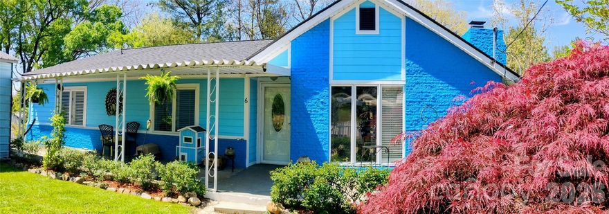 Goldilocks Alert! SELLER'S LOAN IS ASSUMABLE! "TERMS BASED ON BUYER'S QUALIFICATIONS"

Located less than 10 minutes from downtown Asheville and just OUTSIDE THE CITY LIMITS, this versatile 3-bedroom, 3-bath home offers a rare combination of immediate livability and potential for forced appreciation. Set in a peaceful, wooded setting, the property provides both privacy and convenience—ideal for those
seeking a quiet retreat close to the heart of the city.
Inside, the home is move-in ready with plenty of opportunity to personalize and add value over
time. The spacious layout is filled with natural light and offers comfortable everyday living, while
leaving room for thoughtful updates to match your vision.
A standout feature is the large unfinished basement, presenting a prime opportunity to
significantly expand the home’s square footage—perfect for additional living space, a guest
suite, or income-producing potential.
Outside enjoy fresh air and the sounds of nature from the seclusion of the elevated back deck.
Or if you’re looking to stay productive, saunter over to the fully electrified outdoor workshop
located in the back.
Even more rare, the property may offer the potential to subdivide and create an additional lot
(buyer to verify), making this an especially ATTRACTIVE OPTION FOR INVESTORS, builders, or buyers
looking to maximize long-term value.
Recent improvements include a new roof, adding peace of mind and reducing immediate
maintenance needs. Whether you're searching for a primary residence, investment opportunity,
or future development potential, this property delivers flexibility in one of Asheville’s most
desirable and convenient locations.