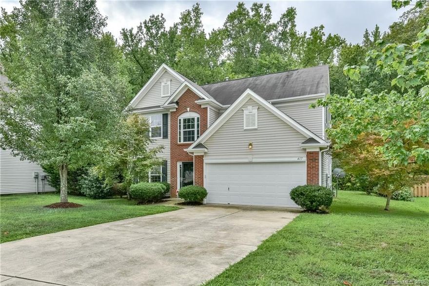 Hardwood floors throughout the first floor invite you into this perfectly staged home. Fresh paint & pendant lighting in the dining room. Kitchen features new stainless steel appliances including gas range & microwave.  Great room has corner gas log fireplace & is wired for surround sound. Office on the main floor is carpeted. Powder room features new vinyl flooring.  4 spacious bedrooms upstairs including the master suite w/ cathedral ceiling & ceiling fan, lg walk-in closet, & master bath.