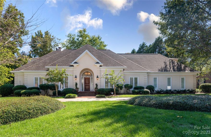 A rare opportunity to live in one of Rock Hill's most desirable neighborhoods. The location seems tucked away but is only 3 miles to I-77. Built by The Warren Norman Company, this unique and beautiful home is filled with natural light. All four bedrooms have recently updated ensuites, the primary bath has a large glass/tile shower and freestanding tub. The spacious primary bedroom has two closets with wooden shelves and drawers, gas log fireplace and access to the large back patio. Entertain in the large open living space that connects the dining room, great room with fireplace, kitchen, breakfast area with beverage bar and sitting room. Pella Windows and Plantation shutters throughout. The Kitchen provides granite countertops, high end appliances with double oven and warming drawer, gas stovetop and a refrigerator. Brand new concrete circular driveway. Upstairs has a large cedar hall closet. Hardwoods throughout and downstairs hardwoods replaced in 2023.