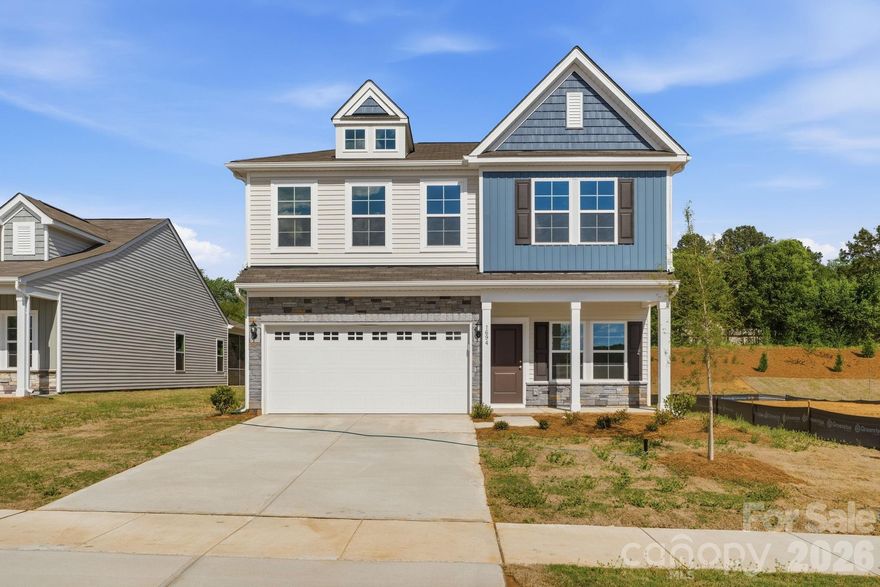 This one-and-one-half-story Durham is a four-bedroom, three-bathroom home with an open floor plan. The kitchen, complete with pantry and an eat-in area and bulk storage closet. The primary bedroom is split from the secondary bedrooms and features a large walk-in closet and an oversized linen closet. Both secondary bedrooms also feature walk-in closets. The laundry room is conveniently located near the garage entry, where there is plenty of storage in the linen closet. Upstairs, you will find a guest suite with a closet and full bathroom and a loft area as well as an additional storage closet and walk-in attic access.  Price already reflects the current incentive. Ask about our closing cost incentives with our preferred lender.