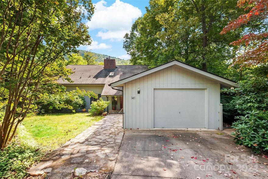 This is the one you've been waiting for! This attractive home neighbors a MRA green space, offering privacy and a bold flowing creek! Lovingly maintained and located just inside the Montreat gate, this home features expansive rooms, perfect for entertaining and hosting. The main level features the primary bedroom with ensuite,dining room,kitchen,living room,1/2 bath and laundry. The upper level has a loft, 2 bedrooms with 2 full bathrooms. The lower level features second living quarters/apartment, including a full kitchen, living room, 2 bedrooms/2 bathrooms. Both main level deck and lower patio offer a treehouse feeling with views of lush trees (some flowering) and a panoramic perspective of Rainbow Mtn. With 2 complete living spaces, this property offers ample space for guests, multiple owners , multi- generational arrangements or long or short term rentals. Montreat features walking trails, hiking, playground, water activities at Lake Susan, and so much more! * Please no drive-bys!