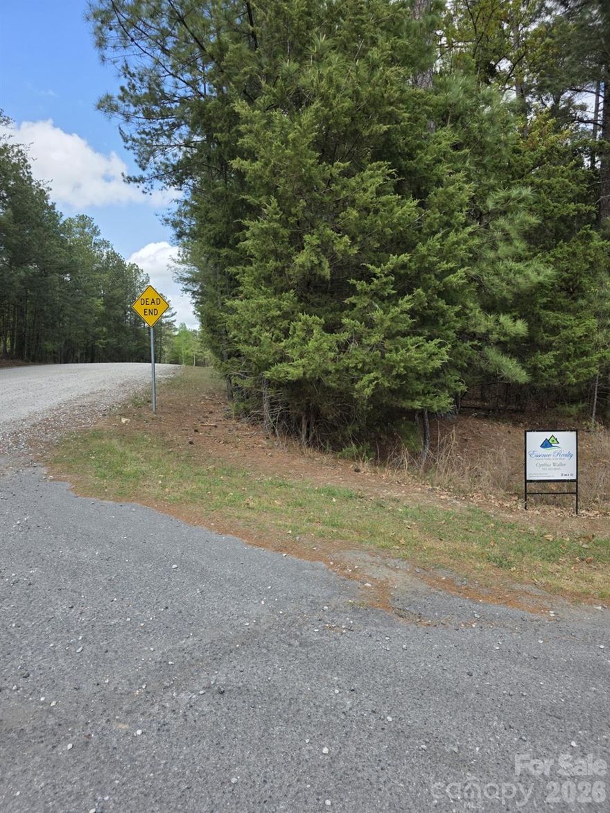 Lake community. Wooded basement lot. Allison Creek Boat landing less than 1 mile  away. Water and sewer and HOA to be verified by buyer. York County and sewer 803-628-3211. Minimum square footage for ranch 1600,1800 for 1.5 story, 2000 for 2-story. Buyer/Agent to verify all pertinent information in decision making process . i.e. square footage, lot size, building requirements , and zoning.