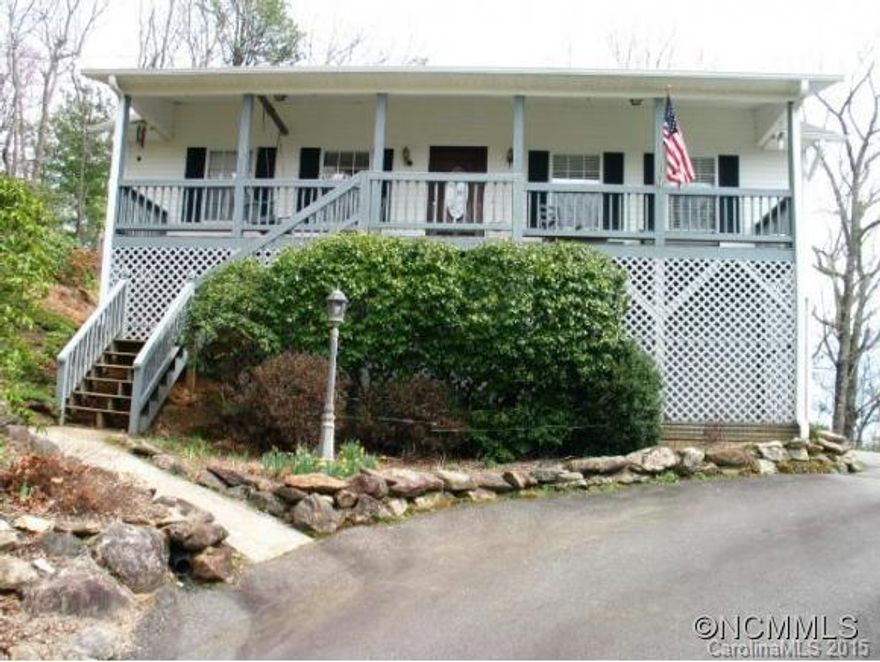 3/2 one owner, well maintained home on .86 acre in quiet, private neighborhood. Hardwoods, tile and carpet. Built-ins in Living Room. 2-car garage, fenced back garden, and views from front and back decks, overlooking native rhododendrons and mountain laurel. Convenient to Hendersonville, Brevard and Asheville.