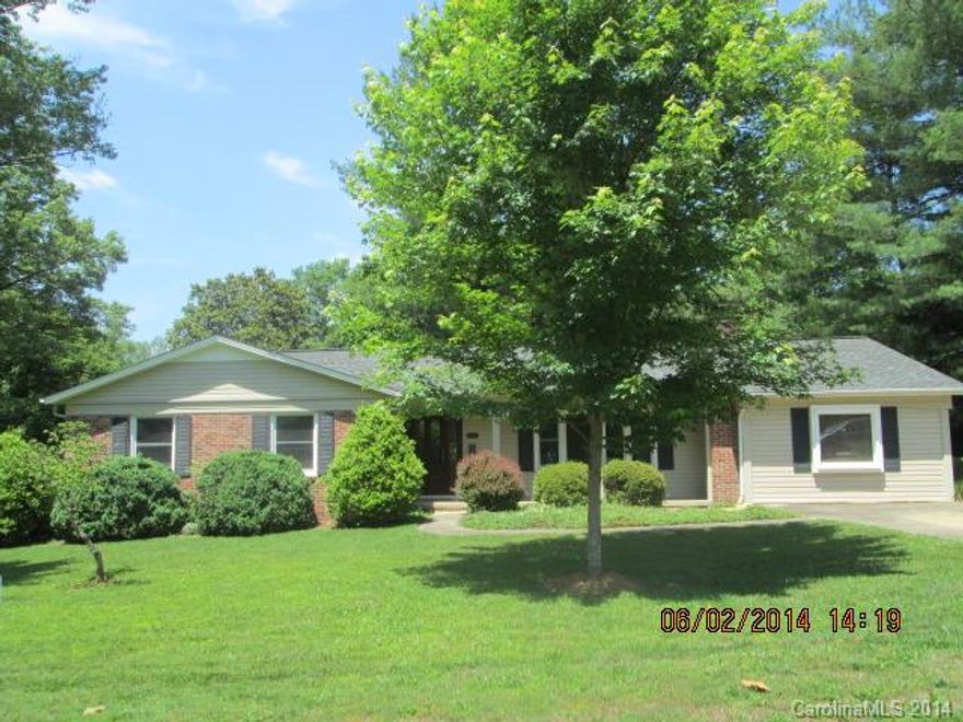 From the leaded glass front door to the private back porch & patio w/a natural gas grill, this home has it all: hardwood floors, tile baths, cherry cabinets, granite counter tops, SS appliances, lighting w/dimmer control.  1-level floor plan, spacious rooms, mature low-maintenance landscaping, eye catching curb appeal. Updated & renovated on a corner lot close to town in northwest Hillcrest neighborhood, this is truly a remarkable home w/amenities that usually are not found in this price range!