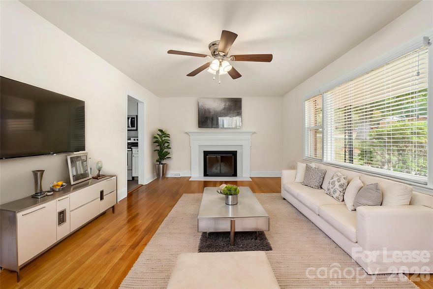 Easy commute to Uptown, SouthPark, & University! You will not be disappointed in viewing this property!! Recent upgrades include freshly painted inside, original hardwood floors in bedrooms, living room, foyer, and hallway, various new lighting, and custom 2" blinds! Although, the fireplace received a facelift two years ago to create a more contemporary vibe, it isn't usable but left for aesthetic reasons. Washer and dryer is included and located in mechanical room! House is pet friendly with minimal conditions. Call listing agent for details. Pet fee stated is per pet.****Please Note: Various Primary Bedroom, Second Bedroom, and Third Bedroom/Office, Kitchen, Livingroom pictures have been virtually staged****