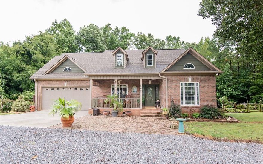 Take a gravel road to a circle drive and 2 acres of a private oasis surrounded by trees. This property boasts an in-ground saltwater pool, two car attached garage AND two car detached garage w/workshop. Indian Land schools and low Lancaster county taxes. Five minute drive to Highway 521. Three bedrooms on main/Upstairs bonus/Walk-in attic. This home does not lack storage space! If you are searching for privacy in a booming area then this home is perfect for you.*Ask about "Added features" list!*